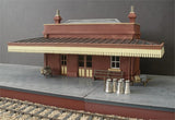 Brick station building with canopy